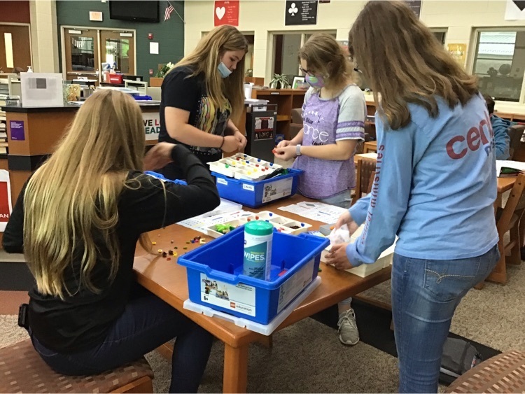 Students organizing kits.