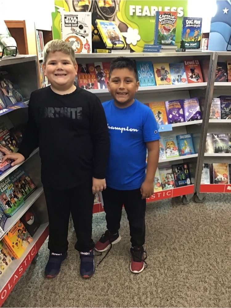 Boys with Book Fair cart.