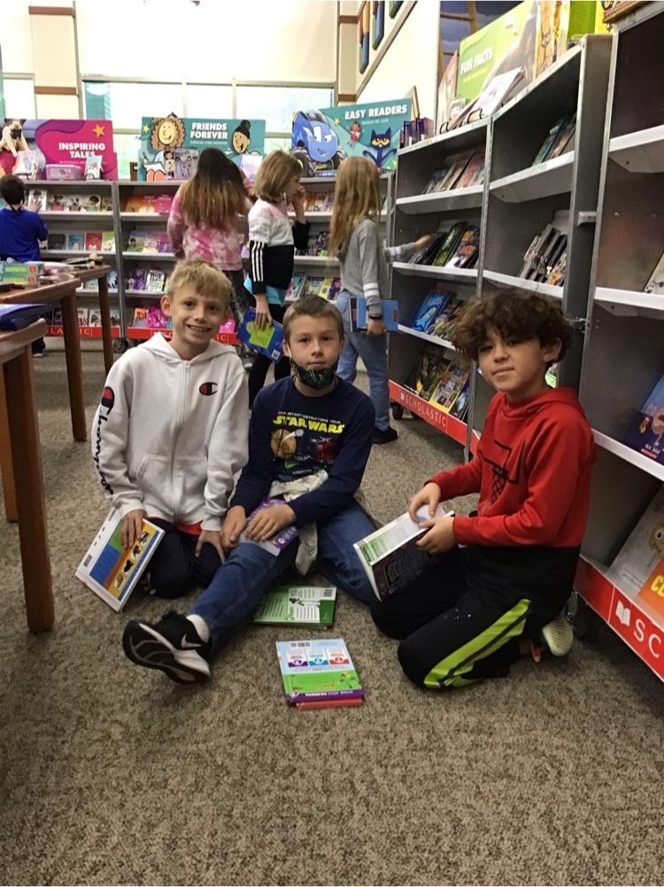 Boys shopping the Book Fair.